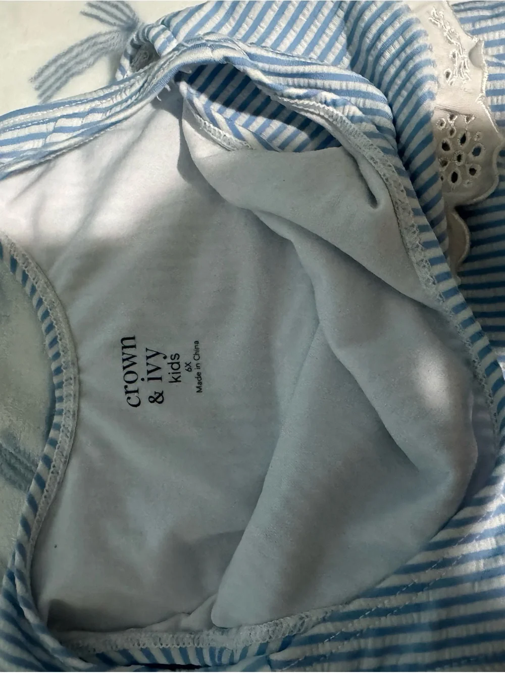 Crown & Ivy Blue and White Striped Kids One-Piece with Eyelet Detail